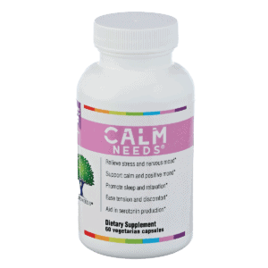 CalmNeeds product bottle against a white background. The product name is in white text against pink color band that wraps around the bottle.